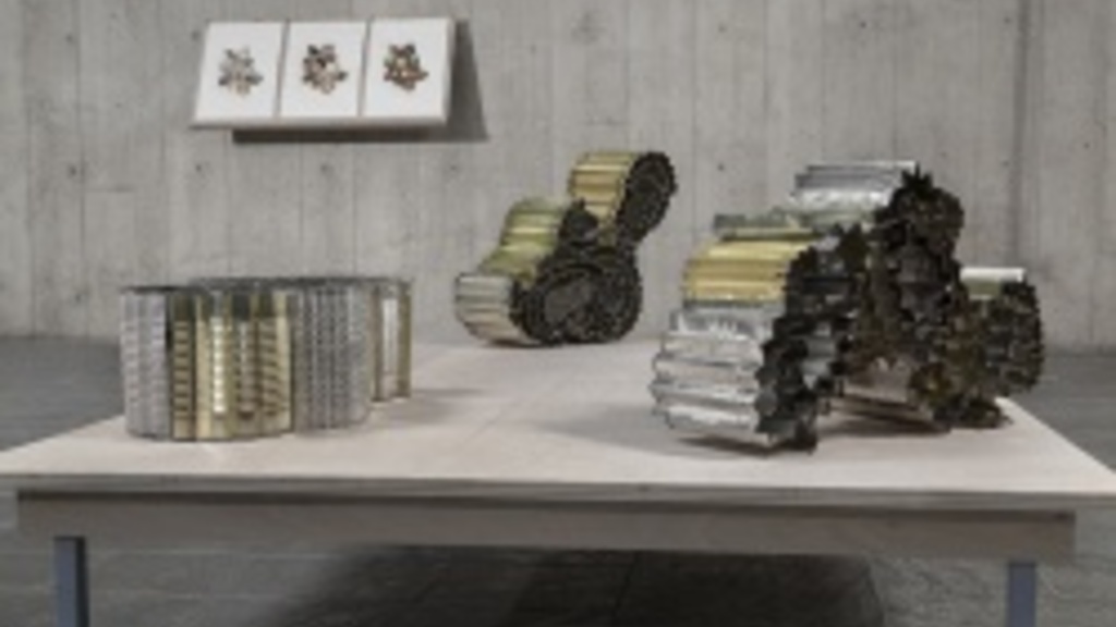 3 crimped tin can sculptures by Terry Conrad