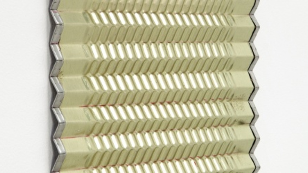 crimped piece of corrugated tin can